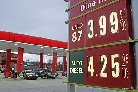 &lt;p&gt;FILE - In this April 9, 2012 file photo, gas prices are posted at a gas station in Breezewood, Pa. Pump prices rose relentlessly from January through April, pushing average gas prices above $3.90 a gallon and taxing families? budgets. Some forecasters expected a $5 peak by the time families got on the road for summer vacations. But prices are expected drop by 10 cents by next week, thanks to a recent drop in oil and wholesale gas prices and frugality at the pump. (AP Photo/Gene J. Puskar)&lt;/p&gt;