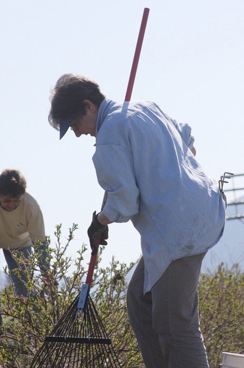 Linda Rocheleau, right, and Rita Lundgren, volunteer their time during Beautification Days.