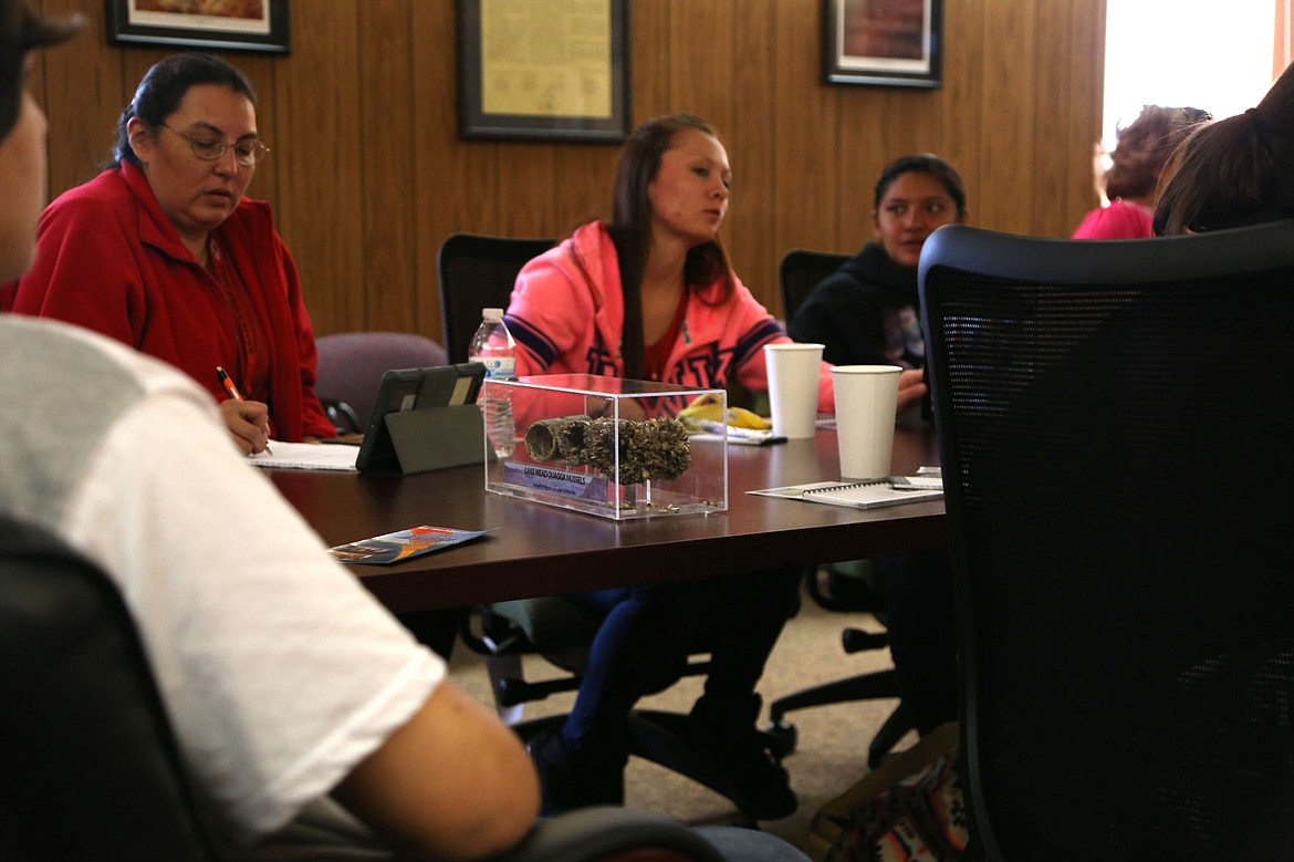 &lt;p&gt;A sample of what mussels look like sits on the table as Two Eagle River students listen to instructions at the Natural Resources and Conservation Department building in Polson before hitting the shoreline.&lt;/p&gt;