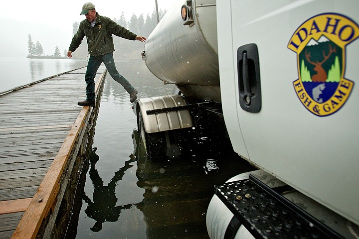 &lt;p&gt;John Rankin, a fish hatchery manager for Idaho Fish and Game, steps back onto the dock after releasing rainbow trout from a tanker truck.&lt;/p&gt;