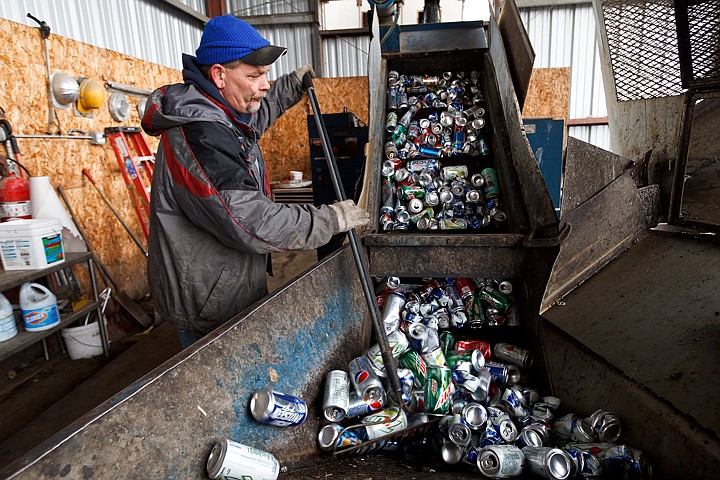 &lt;p&gt;James Oakes, customer service worker for Bluebird Recycling, processes a run of aluminum cans Wednesday during his shift. Aluminum prices are the highest they've been since 2008 at 50 cents per pound.&lt;/p&gt;