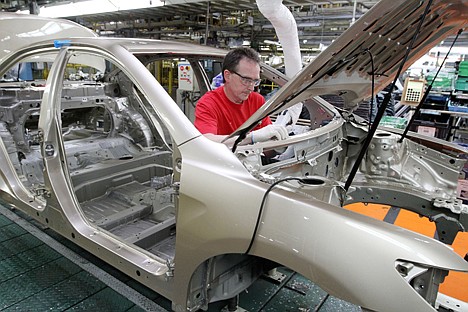 &lt;p&gt;FILE - In this Feb. 25, 2010 file photo, production team member Darryl Ashley installs an inner dash silencer in a Camry on the assembly line at the Toyota Motor Manufacturing plant in Georgetown, Ky. For the first time in more than 20 years, U.S. automakers are questioning a pillar of manufacturing: The practice of bringing parts to assembly lines right before they're used. The March 2011 earthquake knocked out many Japanese parts makers, resulting in factory shutdowns, including this one for a few days, and model shortages around the world. (AP Photo/James Crisp)&lt;/p&gt;