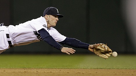 &lt;p&gt;Seattle shortstop Brendan Ryan dives for a grounder during the sixth inning Thursday night. The Mariners defeated the visiting Oakland Athletics 1-0.&lt;/p&gt;