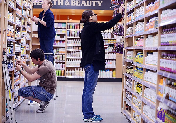 &lt;p&gt;From right, Jacy Jones, the vitamin manager, Benjamin Lehman and Debby Breckon carefully stock and arrange items on shelves on Thursday, April 18, at the Natural Grocers store in Kalispell. (Brenda Ahearn/Daily Inter Lake)&lt;/p&gt;