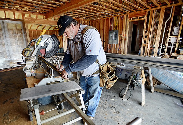 &lt;p&gt;&lt;strong&gt;Ron McLoy&lt;/strong&gt;, an independent contractor for Rob Brewer Construction, works on a house in The Lakes in Whitefish on Friday afternoon.&#160;&lt;/p&gt;