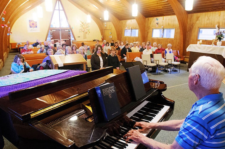 &lt;p&gt;Director Ron Bond, right, plays the piano during an April 11 rehearsal for the Columbia Falls Community Choir at the United Methodist Church in Columbia Falls. The choir performs Saturday and Sunday.&lt;/p&gt;