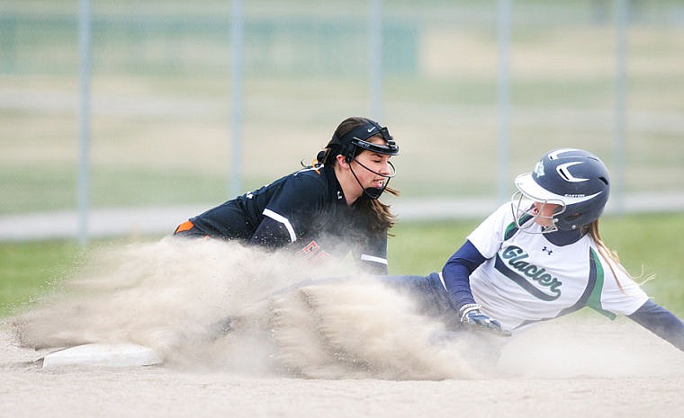 &lt;p&gt;Glacier sophomore Kayla Russell slides safely into third past Flathead third baseman Mackenzie Twichel Thursday afternoon during the first game of softball doubleheader at Kidsports Complex.&#160;&lt;/p&gt;