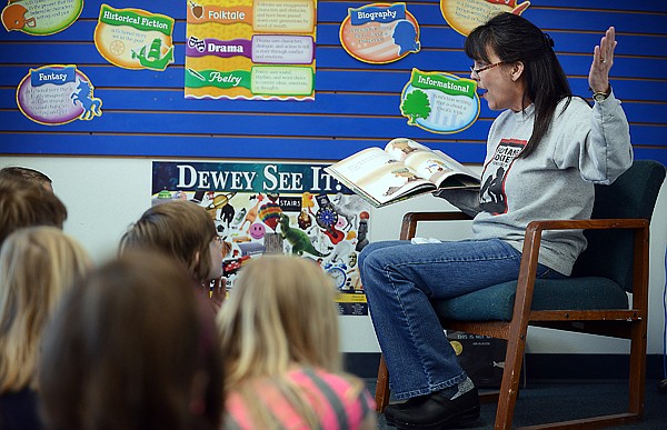 &lt;p&gt;Humane Society of Northwest Montana Executive Director Lori Heatherington reads to students as part of National Library Week on Thursday, April 18, at Russell Elementary School in Kalispell. (Brenda Ahearn/Daily Inter Lake)&lt;/p&gt;