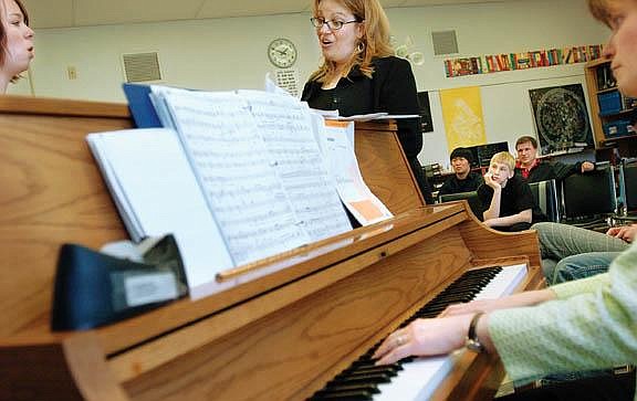 Chris Jordan/Daily Inter LakeGina Lapke, a vocal adjudicator from Missoula, works with Flathead High School Junior Mariesa Walberg during the annual District One Music Festival Friday afternoon at Flathead High School. The festival brings together students from nine northwest Montana high schools together fro three days of music performance and education. The festival continues through 5 p.m. Saturday and is free and open to the public.