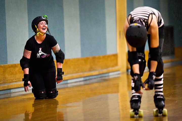 &lt;p&gt;Karissa Kory, aka &quot;Bombshell Brawler,&quot; left, laughs as she gets up following a collision with fellow Pink Slip Sally skater Terra Pring, &quot;Poly Pocket Rocket.&quot;&lt;/p&gt;
