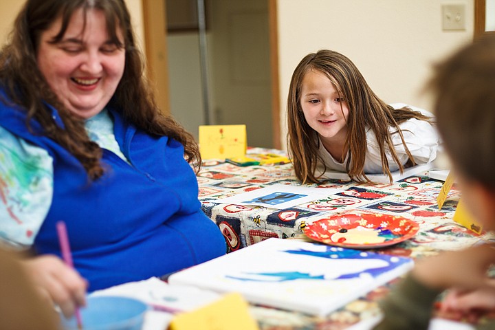 &lt;p&gt;SHAWN GUST/Press Kenzie Hunt, 7, gets a closer look at Christine Camp-Hankinson, a volunteer art teacher for the Post Falls recreation department, while learning about painting techniques Wednesday at the Tree House.&lt;/p&gt;