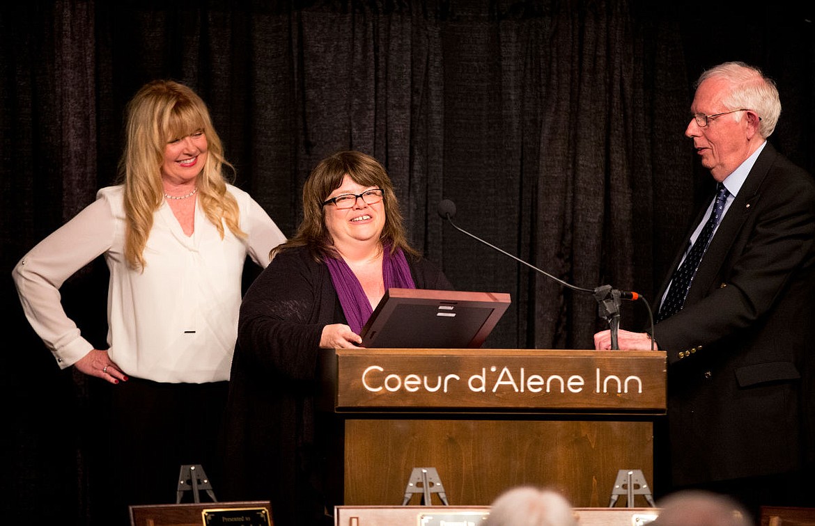 &lt;p&gt;Coeur d'Alene Press City Editor Maureen Dolan, center, thanks the community of Coeur d'Alene and the Kootenai County Task Force on Human Relations on Friday after receiving the Task Force's Civil Rights Excellence in Journalism award. The Task Force's President Christie Wood and Secretary Tony Stewart are on either side of Dolan.&lt;/p&gt;
