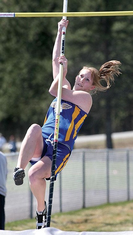 Photo by Ed Moreth Lady Hawk Rheanna Padden tries for 8 feet, 1 inch after breaking the school&#146;s record of a 7-foot, 8-inch pole vault.