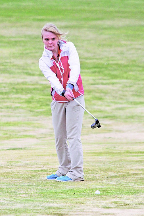 <p>Superior's Sierra Brunning putts onto the eight green in Ronan on April 15.</p>