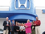 Discovery Honda cuts ribbon