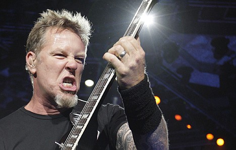 &lt;p&gt;James Hetfield of the American heavy metal band Metallica performs on stage during their World Magnetic tour in Vilnius, Lithuania, Tuesday April 20, 2010. (AP Photo/Mindaugas Kulbis)&lt;/p&gt;