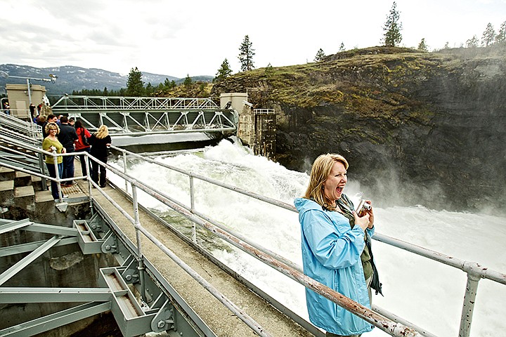 &lt;p&gt;JEROME A. POLLOS/Press Kay Viebrock laughs as some her River City Leadership Academy classmates walk atop the Post Falls Dam spillway during a tour Wednesday for the water and transportation class. The group learned about the history and importance of the dam, as well as statistics about how much water flows through the spillway at full capacity.&lt;/p&gt;