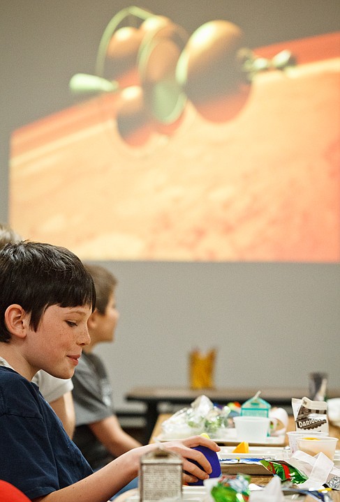 &lt;p&gt;SHAWN GUST/Press Joe McDonald, a fourth grade student at Ramsey Magnet School, listens to a speaker from the Idaho National Laboratory about what Idaho scientists are doing in regard to Mars research during a Junior Science Cafe Wednesday at the Coeur d'Alene elementary school. The program, organized by Ramsey's student council, offers children learning and leadership opportunities throughout the year during their lunch period.&lt;/p&gt;