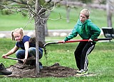 Crowd of kids joins tree celebration
