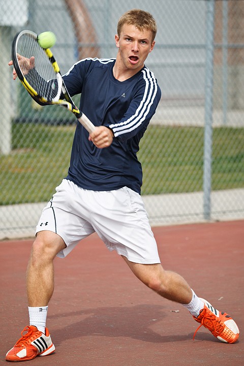 <p>SHAWN GUST/Press Matt Finney connects his backhand with the ball.</p>