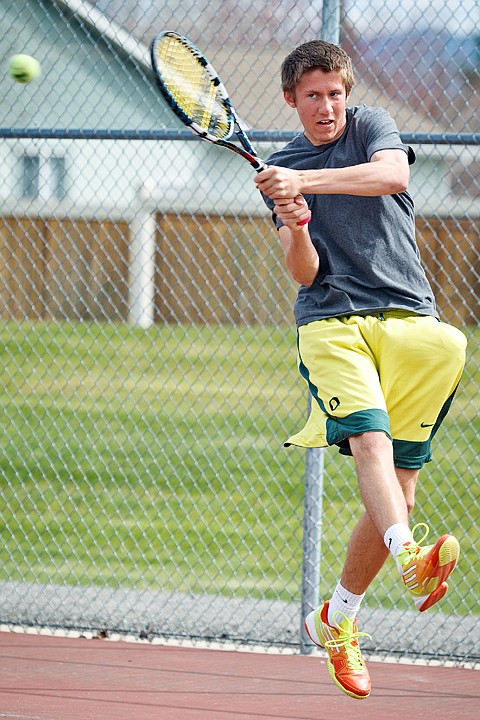 <p>SHAWN GUST/Press Luke Ness returns the ball during a recent practice.</p>