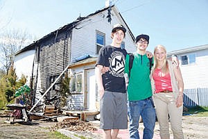 <p>Flathead High School juniors helped to evacuate residents of a burning home on Tuesday. Jacob Javorsky, left, called emergency services while Tanner Archuleta, center, ran into the burning building to alert residents of the fire. Amanda Buxton, right, also called school resource officer Cory Clarke to ensure emergency services got to the scene as quickly as possible. (Brianna Loper/The Daily Inter Lake)</p>
