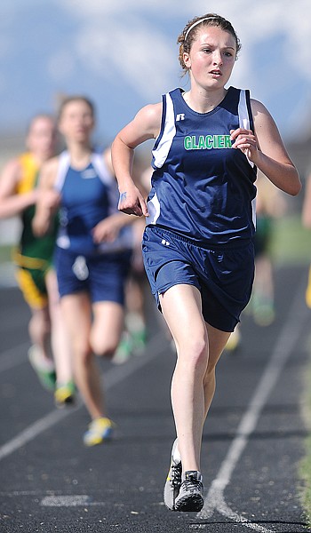 Glacier freshman Anna Deleray heads for the turn during one of the laps in the 800 on Tuesday at Glacier High School in a dual meet with Whitefish. Deleray won the event with a time of 2.28.92. She also ran a leg on the winning 1,600 relay team.