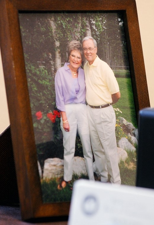 A photo taken several years ago of Lauman and his wife, Lois, who have been married for 45 years, sits on his desk.