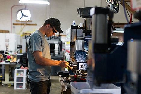 &lt;p&gt;Mike Browning operates a t-nut machine during the assembly process of Tedder Industries&#146; holsters.&lt;/p&gt;