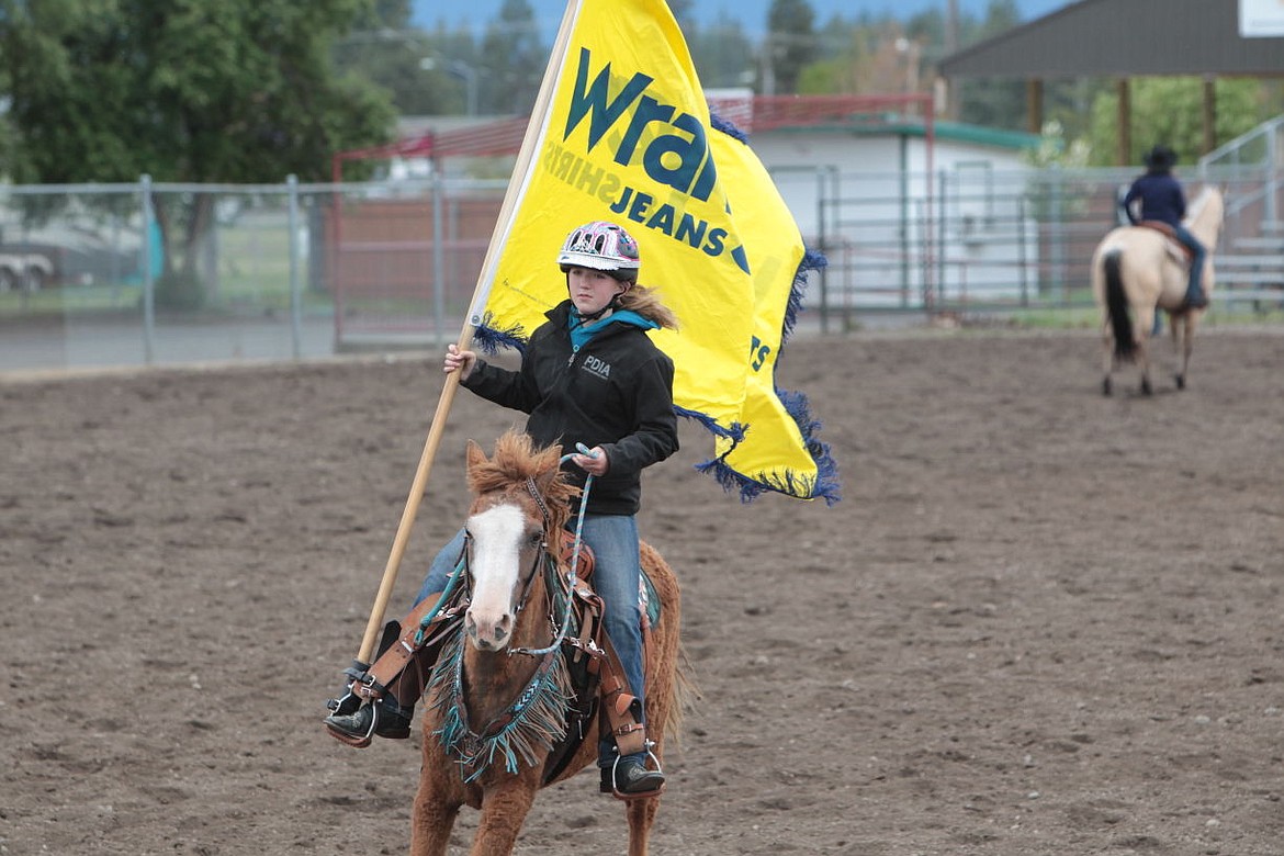 &lt;p&gt;International Curly Horse Ambassador, Sarah Thaut, 12, of Harrison, practices a flag run Sunday during the first-ever &quot;Rodeo Queen and Ambassador Camp,&quot; hosted by Miss Gem State Stampede and North Idaho Fair at the Kootenai County Fairgrounds.&lt;/p&gt;