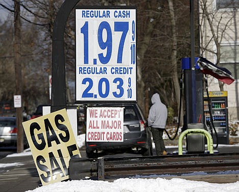 &lt;p&gt;Gas prices less than two dollars a gallon are seen at a service station in Leonia, N.J. on Jan. 9.&#160;&lt;/p&gt;