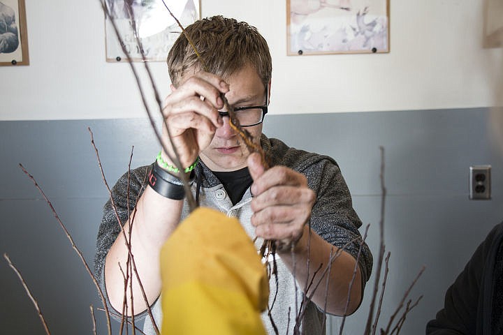 &lt;p&gt;Danny Adamson, 19, bags tree seedlings. The seedlings are dipped in a substance that keeps the roots wet until they are planted. Adamson is one of the students that came with Venture High School to volunteer. The seedlings will be given to Kootenai County&#146;s fourth graders in celebration of Arbor Day.&lt;/p&gt;