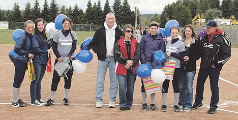 &lt;p&gt;Before Saturday&#146;s softball game, the team&#146;s seniors and foreign exchange students were recognized. Three foreign exchange students played on the Badger softball team this year. Shio-Mhara Roldan Andrade is a sophomore from Spain. Elisabeth Marie-Angele Sougne is a senior from Belgium. Sandra Brkanovic is a junior from Montenegro.&lt;/p&gt;
&lt;p&gt;Seniors Aaramie Hoisington and Lindsay Taggart, pictured with their parents, were recognized for their commitment to softball. Hoisington has been playing softball for 10 years and Taggart for 14 years.&lt;/p&gt;
&lt;p&gt;&lt;/p&gt;&lt;p&gt;&lt;/p&gt;