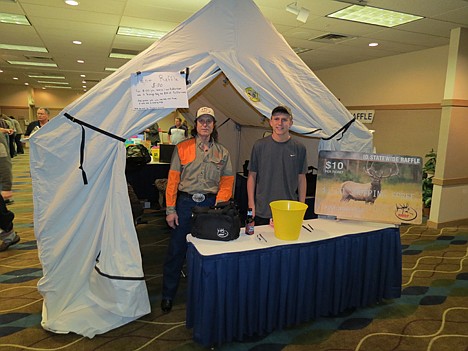 &lt;p&gt;Volunteers Wayne Reichenberg and Jacob Kaski at the tent raffle held during the 2012 banquet.&lt;/p&gt;