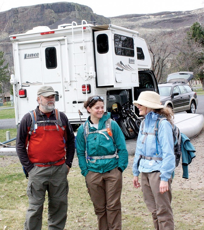 Larry Nichols, his daughter Lyndsey (center), and wife Sally climbed Steamboat Rock to enjoy the view.