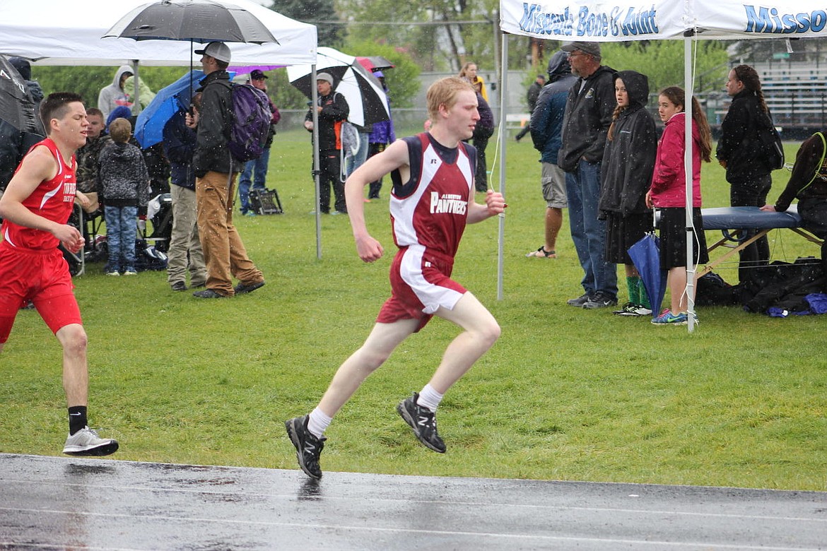 &lt;p&gt;Alberton&#146;s Griffin Pluth takes fourth in the 800 meter race, missing third by a fraction of a second, during Saturday&#146;s rainy track meet in Missoula&lt;/p&gt;