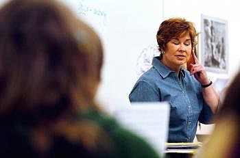 Jenanne Solberg tells her choral students to use their ears as they sing. Solberg teaches choir and orchestra at Whitefish Middle School and orchestra at Whitefish High School. She also gives private lessons, runs summer music camps and conducts the Whitefish Community Orchestra. Nate Chute/Daily Inter Lake