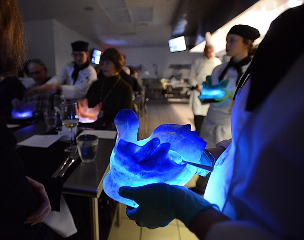 <p>As the intermezzo a liche sorbet topped with amaretto was served in colored, lighted swan ice sculptures topped with at the first Chef's Table Vegetarian Night on Friday, April 19, at Flathead Valley Community College. (Brenda Ahearn/Daily Inter Lake)</p>