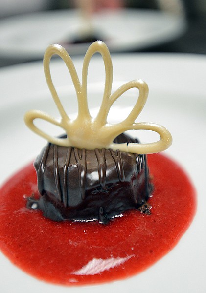 <p>Dessert for the evening was a flourless almond chocolate cakes and strawberry coulis at the first Chef's Table Vegetarian Night on Friday, April 19, at Flathead Valley Community College. (Brenda Ahearn/Daily Inter Lake)</p>
