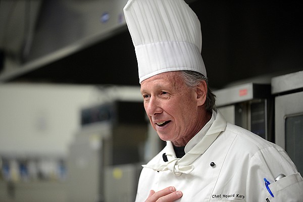 <p>Chef Howard Karp welcomes patrons to the first Chef's Table Vegetarian Night on Friday, April 19, at Flathead Valley Community College. Karp has been with the college since 2008. (Brenda Ahearn/Daily Inter Lake)</p>