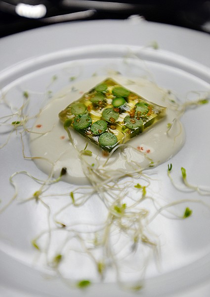 <p>Detail of the amuse-bouche course, a pencil green asparagus terrine, designed to awaken the palette. (Brenda Ahearn/Daily Inter Lake)</p>