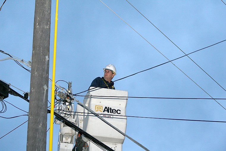 <p><span><strong>Bob Hardebeck of Northwestern Energy works to repair a power line that caught fire in Superior.</strong></span></p>
<div><span><strong><br /></strong></span></div>
