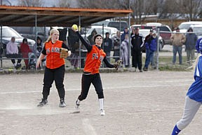 Sophomore pitcher Aspen Rude throws to get an out at first after scooping up a ground ball in a win over Drummond. Rude pitched eight innings, struck out 16 batters and allowed just three hits on Thursday.