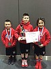 Family trio shines in kids wrestling tourney