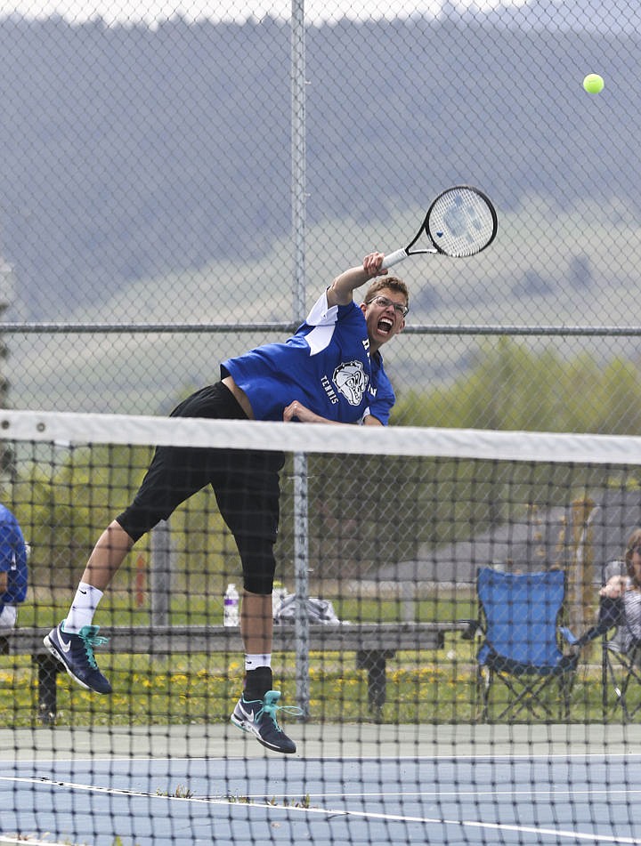 &lt;p&gt;Tim Van Elst serves during a doubles match Friday in Mission.&lt;/p&gt;