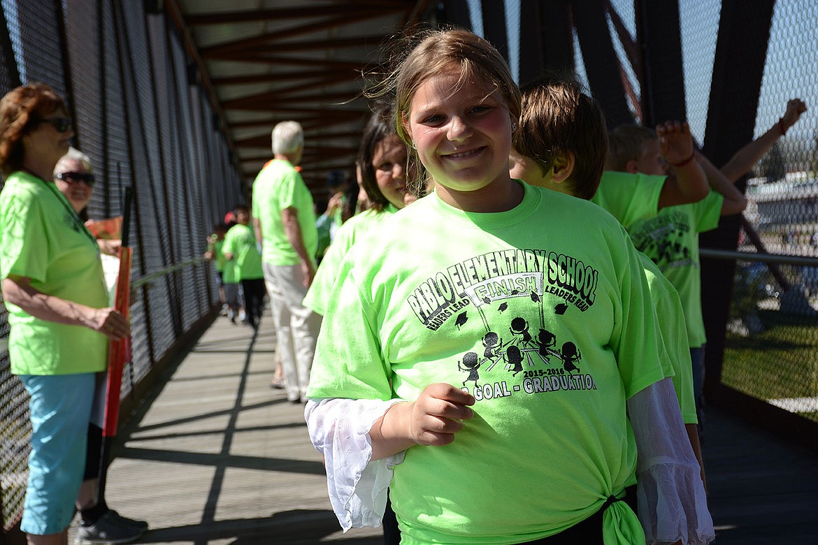 &lt;p&gt;Elliott Natz Lake County Leader Amarah Diebble, 10, leads Pablo Elementary School's classes to the bridge over Highway 93.&lt;/p&gt;