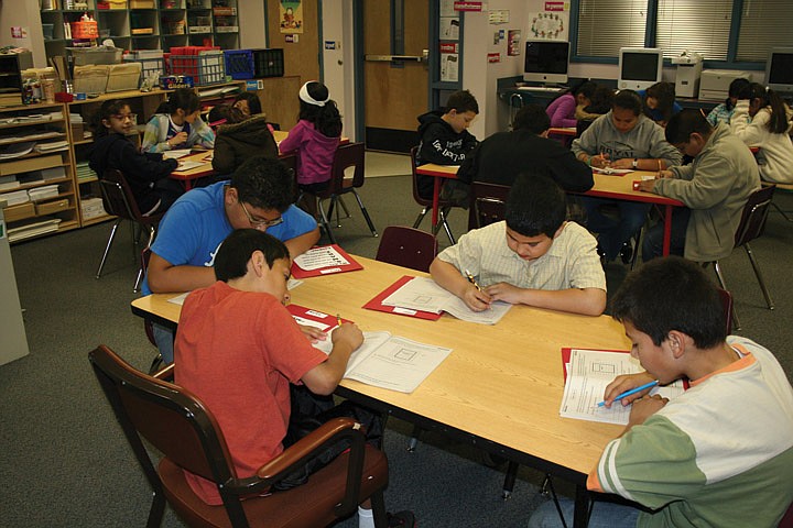 Students in a fourth-grade classroom at Red Rock Elementary in Royal City practice for the upcoming state-mandated Measurement of Student Progress in math.
