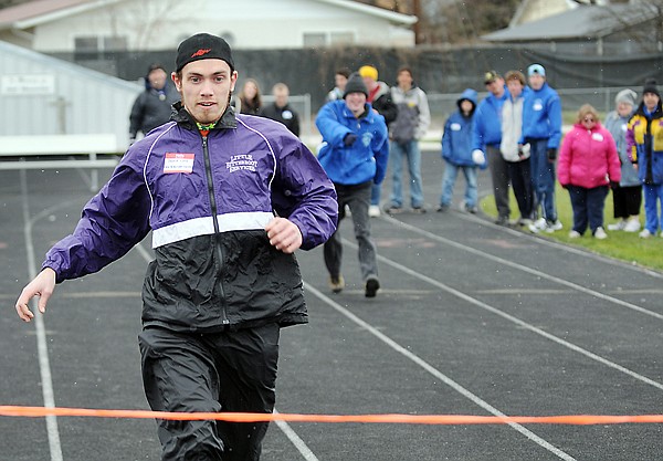 Donald Lord of the Little Bitterroot Services team runs in the 25 meter track event on Friday during the Special Olympcis.