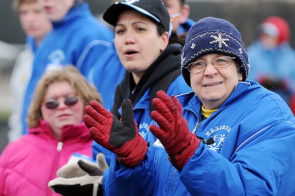 Kathy Rose cheers during at race on Friday at the Special Olympics.