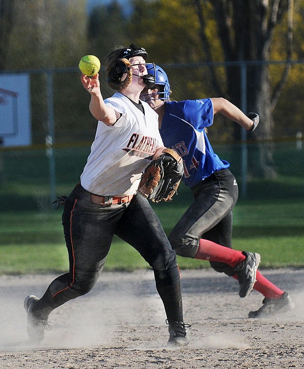 <p>Flathead shortstop Kylee Meredith fires to first base for an out during the Bravettes' 9-1 loss to Columbia Falls Wildkats at Boyle Field on Tuesday. (Aaric Bryan/Daily Inter Lake)</p>